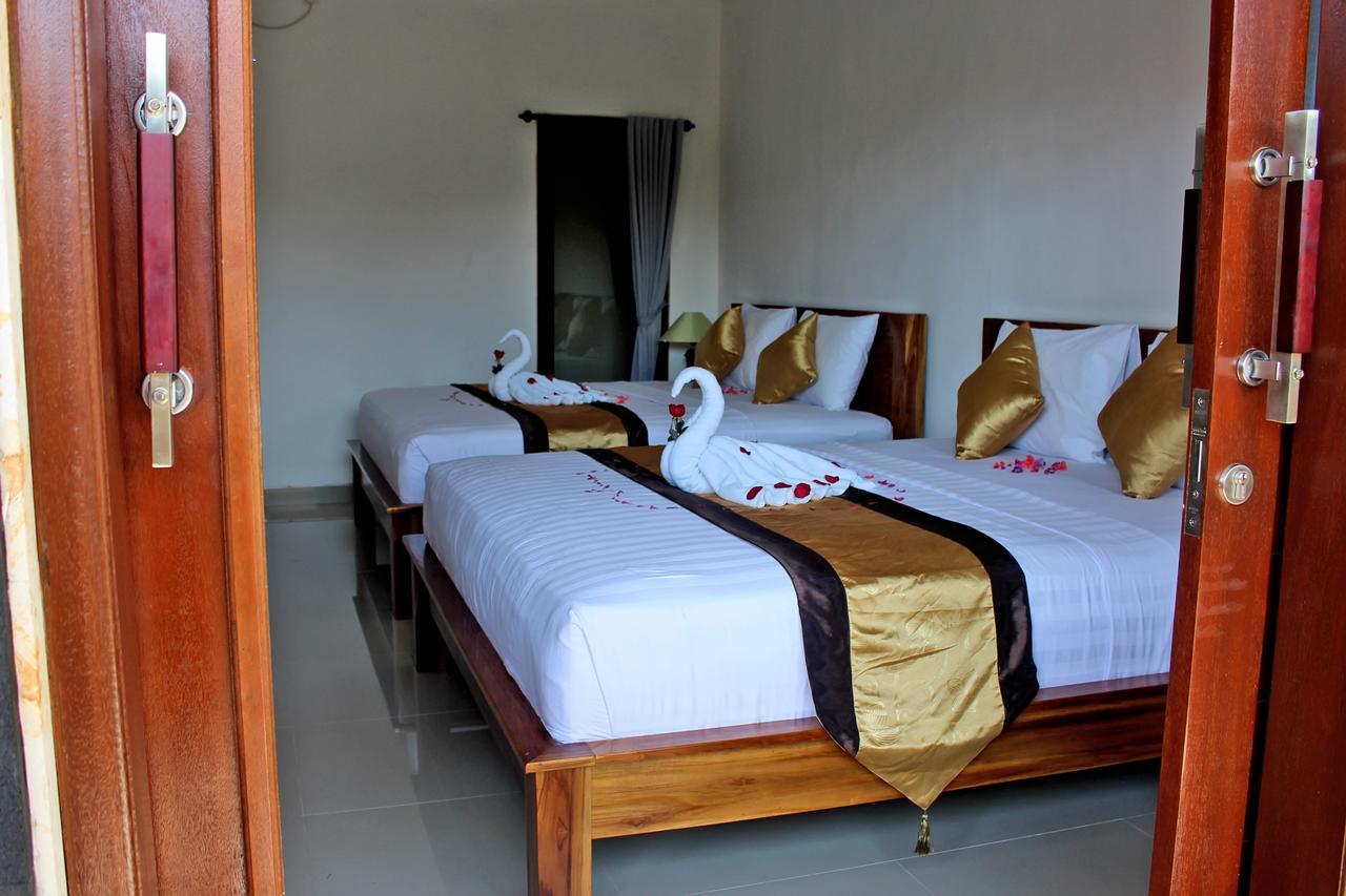 Kusuma Guesthouse Canggu Extérieur photo
